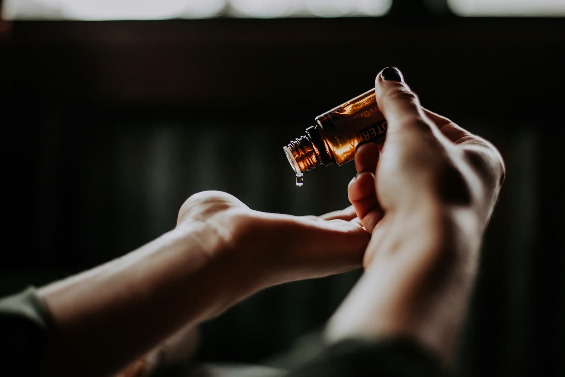 Natural massage oil in a warm, relaxing setting